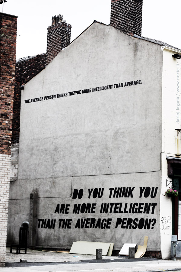 The Lord Warden pub in Liverpool, England with the message "The average person thinks they're more intelligent than average. Do you think you are more intelligent than the average person?" stenciled on the side.