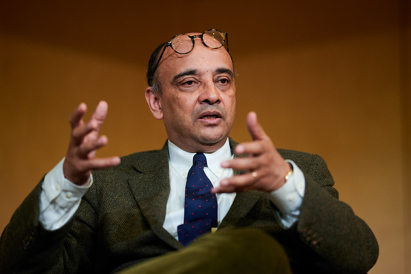 Kwame Anthony Appiah gesticulates with his hands while speaking.